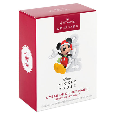 Mickey Mouse in Santa hat and scarf smiles next to a glittery “2025” snow sculpture in this festive Hallmark Keepsake Disney ornament.