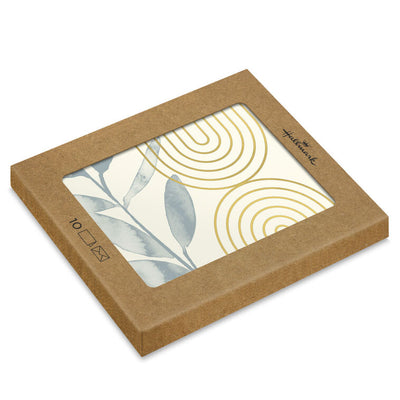 Ivory blank note cards with blue-gray eucalyptus branch artwork and gold foil concentric arch accents.
