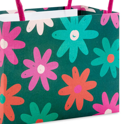Assorted mini horizontal gift bags with pink stripes, polka dots, squiggles, and multicolor daisies, pink handles, Hallmark
