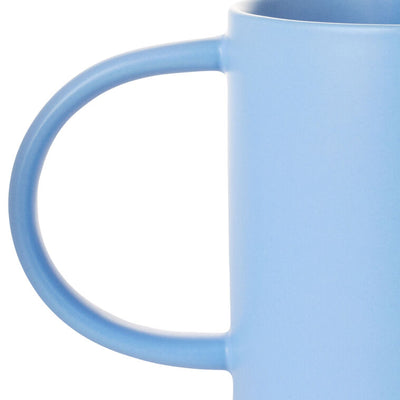 Bright blue ceramic mug with "Best Papa Ever" text, blue ribbon design, oversized handle, and recessed base for stacking.