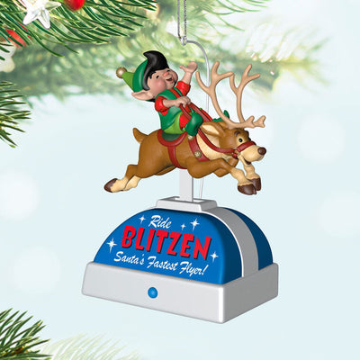 Elf riding Blitzen the reindeer musical ornament with motion, playing "William Tell Overture" holiday keepsake.

