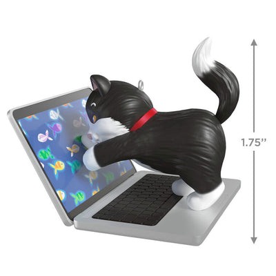 Hallmark Keepsake ornament of black-and-white tuxedo kitten playing with laptop showing colorful fish, Mischievous Kittens series