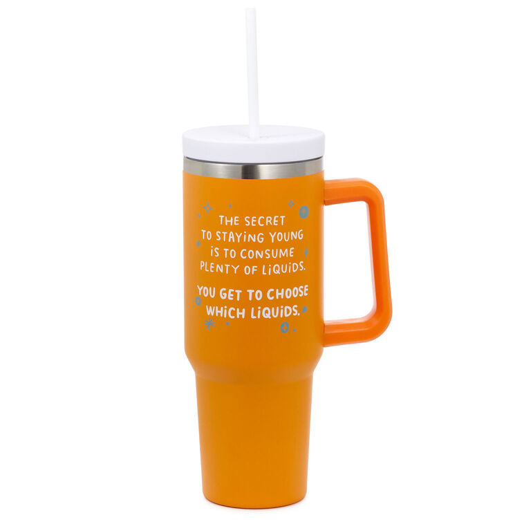 Large orange insulated travel tumbler with handle, straw, and white quote: staying young is to consume plenty of liquids.”