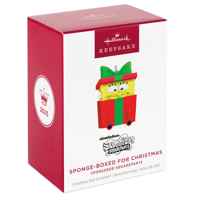 SpongeBob SquarePants ornament, yellow character in red gift box with green bow, Hallmark Keepsake, Christmas tree decoration.