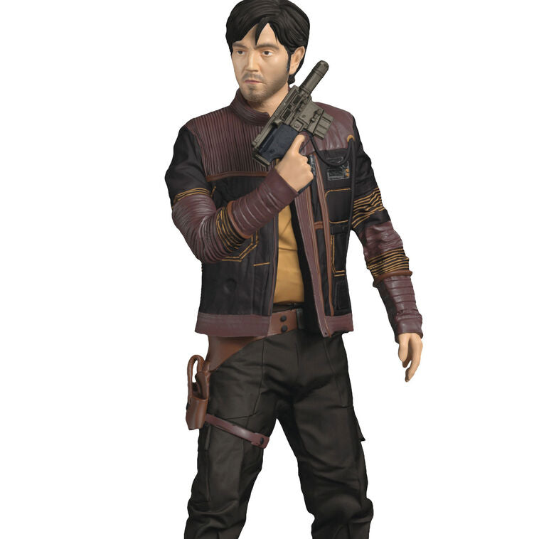 Cassian Andor Christmas ornament holding blaster, wearing brown tactical gear and scarf