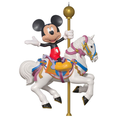 Hallmark Keepsake Disneyland King Arthur Carrousel ornament featuring Mickey Mouse riding a white carousel horse with gold pole, colorful saddle.