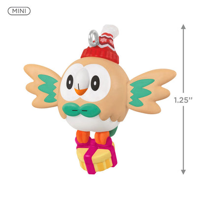 Mini Rowlet ornament, beige owl with green bow tie, red winter hat, and yellow gift box, Hallmark Keepsake Pokémon Christmas collectible
