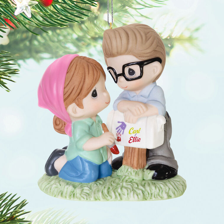 Porcelain ornament of Carl and Ellie from Disney Pixar’s Up painting a mailbox, in Precious Moments style