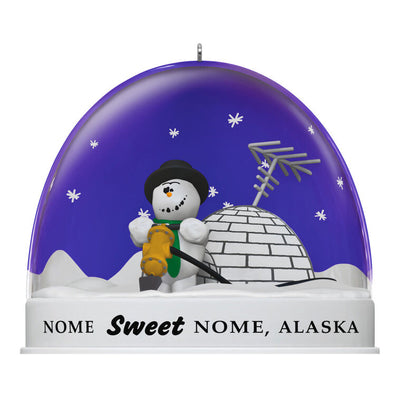 Hallmark Keepsake Knick Knack Snow Globe Escape Plan ornament with snowman inside snow globe labeled Nome, Alaska, Disney/Pixar Christmas decoration.