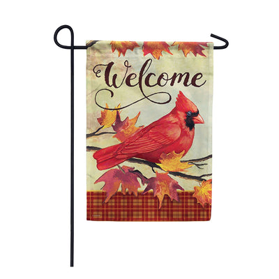 Fall welcome flag with red truck carrying pumpkins and fall leaves.