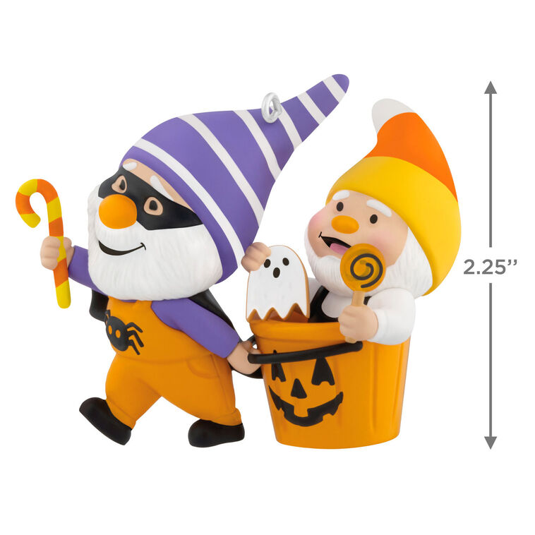 Halloween ornament of two gnomes, one dressed as bat and one with candy corn hat in jack-o&