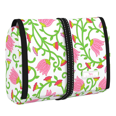 SCOUT Beauty Burrito hanging toiletry bag in Late Bloomer print, clear zipper compartments, folds up with elastic band, travel-friendly.