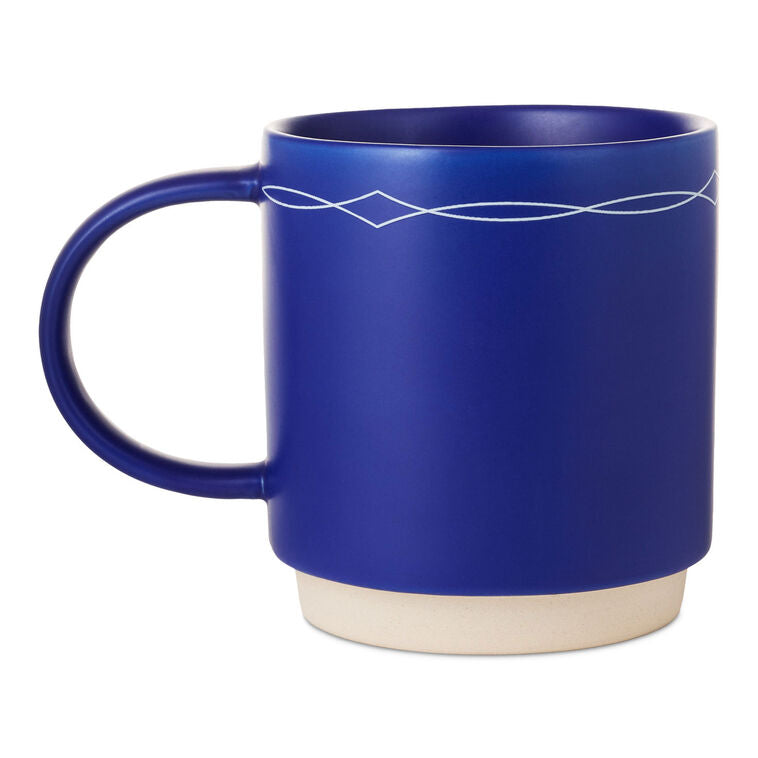Cobalt blue ceramic mug with white text that reads “This ain&