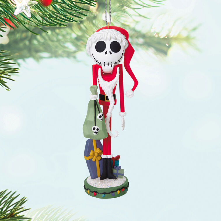 Santa Jack Skellington nutcracker ornament in red suit with moving mouth from The Nightmare Before Christmas.

