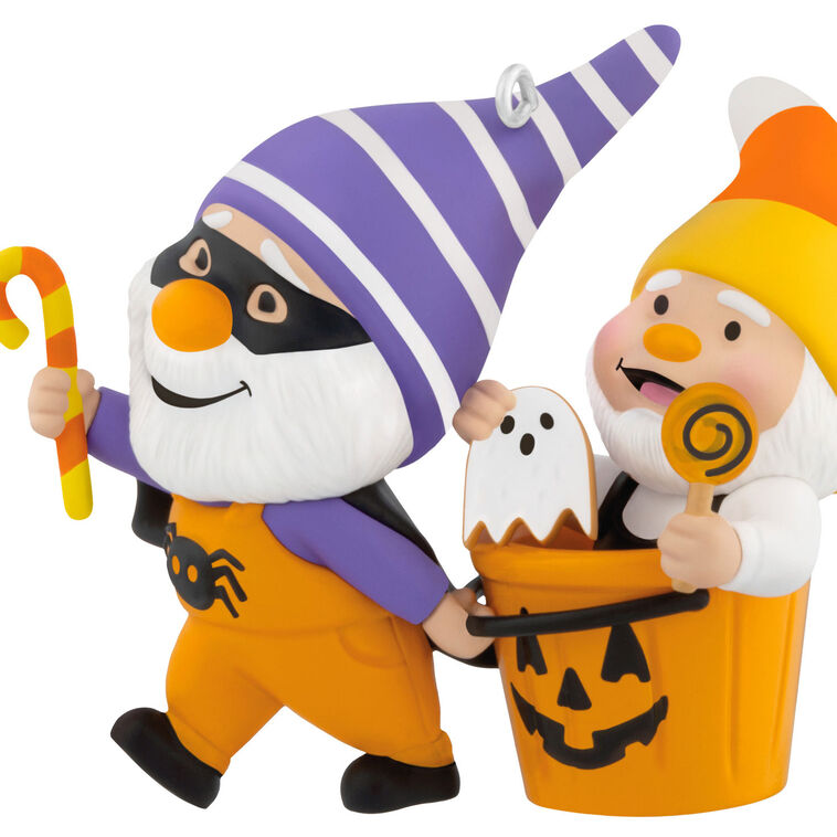 Halloween ornament of two gnomes, one dressed as bat and one with candy corn hat in jack-o&