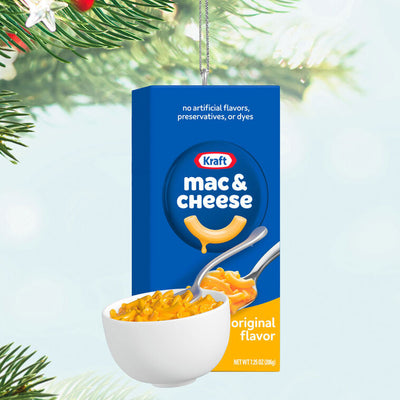 Hallmark ornament of Kraft Mac & Cheese blue box with bowl of cheesy pasta and spoon.