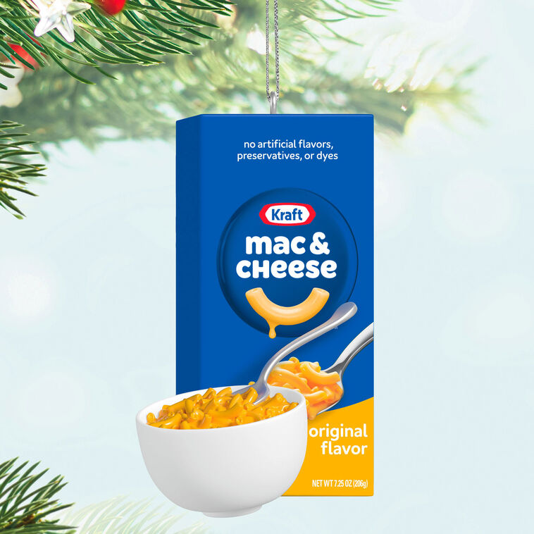Hallmark ornament of Kraft Mac & Cheese blue box with bowl of cheesy pasta and spoon.