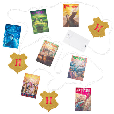 7-foot Harry Potter string lights with sculpted books and Hogwarts crests, white LED glow and clear wire.

