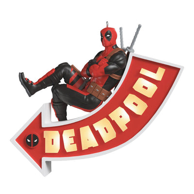 Deadpool ornament, Marvel character in red and black suit, arrow sign marquee, Hallmark Keepsake, Christmas decoration, light-up feature.