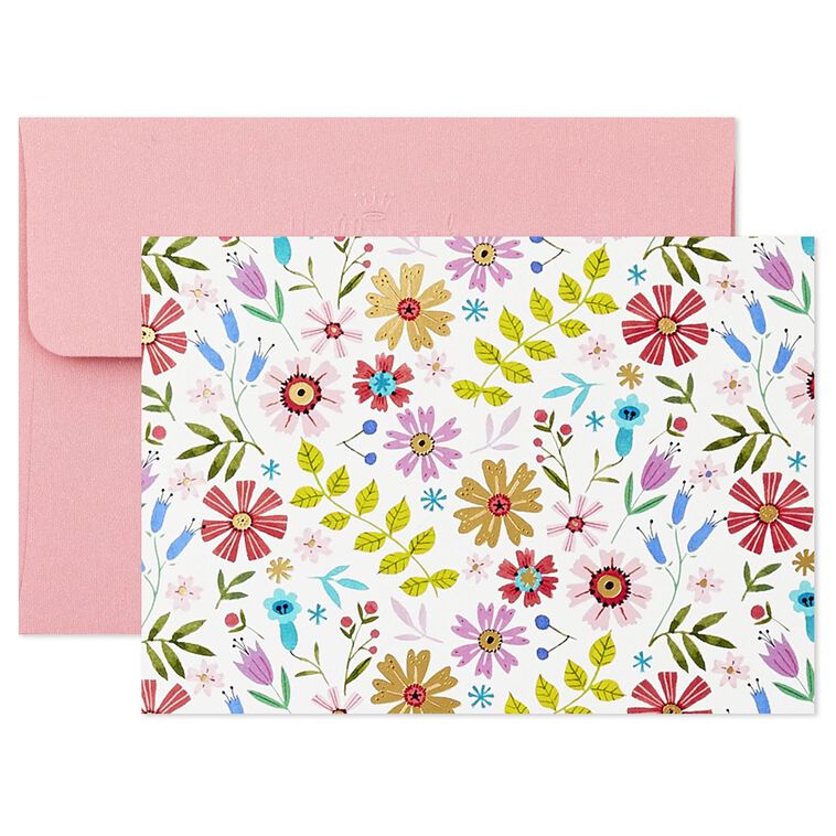 Assorted whimsical note cards with gold foil accents in multiple designs, includes envelopes and reusable caddy.