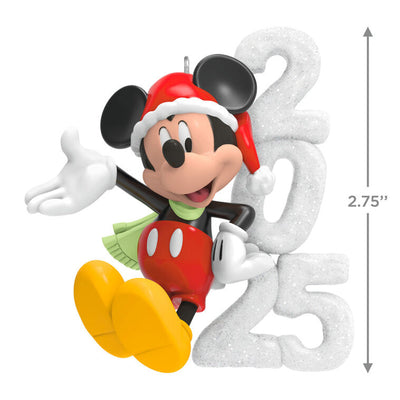 Mickey Mouse in Santa hat and scarf smiles next to a glittery “2025” snow sculpture in this festive Hallmark Keepsake Disney ornament.