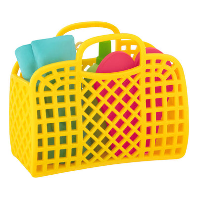 Yellow beach bag ornament with flip-flops, swim towel, sunglasses, and sunscreen, perfect for summer-themed holiday decor

