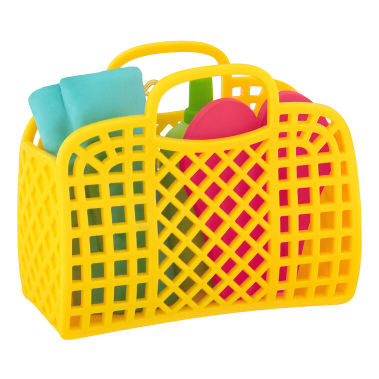 Yellow beach bag ornament with flip-flops, swim towel, sunglasses, and sunscreen, perfect for summer-themed holiday decor

