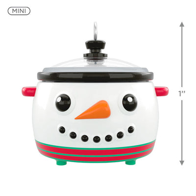 Mini slow cooker Christmas ornament with snowman face, red and green accents, Hallmark Keepsake holiday collectible

