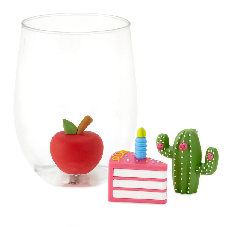 Clear plastic stemless contour glass with center post for holding silicone charms; 19.5 oz capacity, dishwasher safe.
