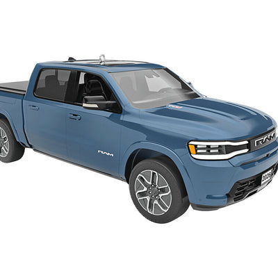 Blue Hallmark Keepsake metal ornament of 2026 Ram 1500 REV truck with detailed design, perfect for Christmas tree decorating.