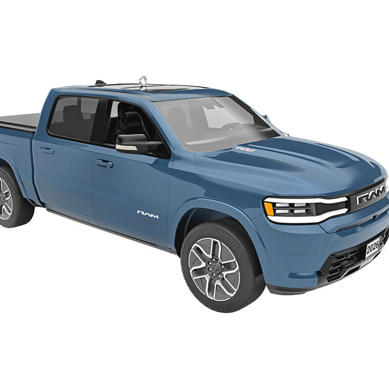Blue Hallmark Keepsake metal ornament of 2026 Ram 1500 REV truck with detailed design, perfect for Christmas tree decorating.