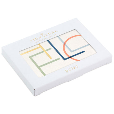 Boxed blank notes with colorful modern lettering on off-white cardstock and gold foil accents, includes foil-lined envelopes.
