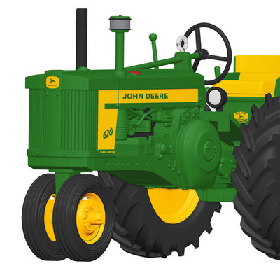 Hallmark Keepsake John Deere 620 Tractor ornament, die-cast metal in green and yellow, wheels turn, classic farm tractor design.