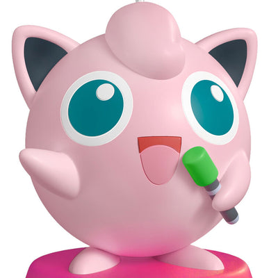 Hallmark Keepsake Pokémon Jigglypuff ornament, pink and round, singing into green microphone, with sound, on pink base.