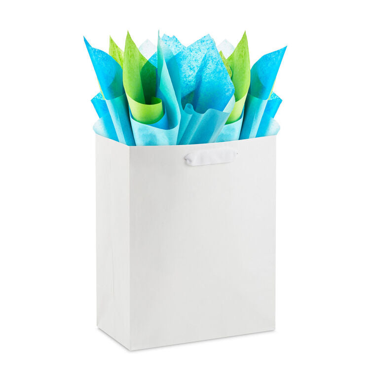 Hallmark tissue paper assortment with 12 sheets in solid blue, citrus green, and aqua for colorful gift wrap.