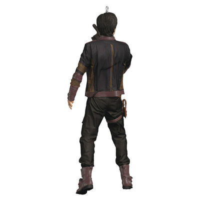 Cassian Andor Christmas ornament holding blaster, wearing brown tactical gear and scarf