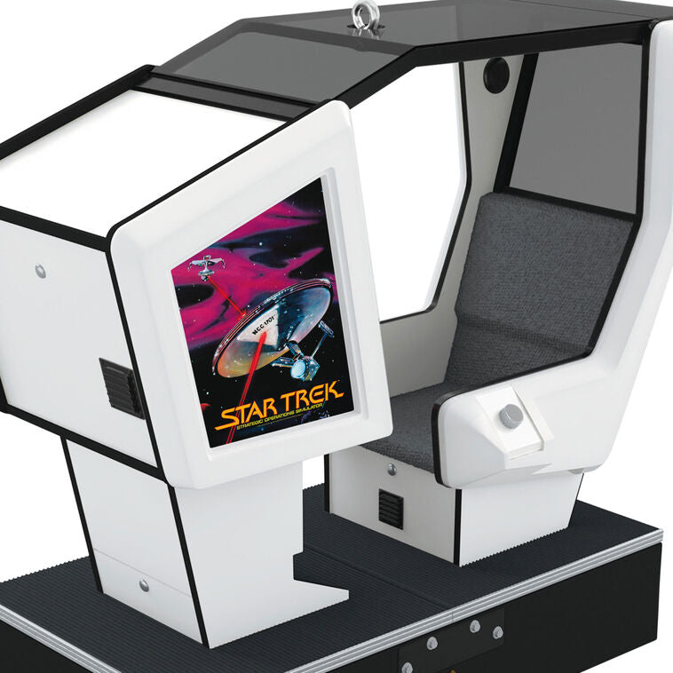 Hallmark Star Trek arcade game ornament—miniature 1980s simulator cabinet with screen, joystick, and seat, lights and sound