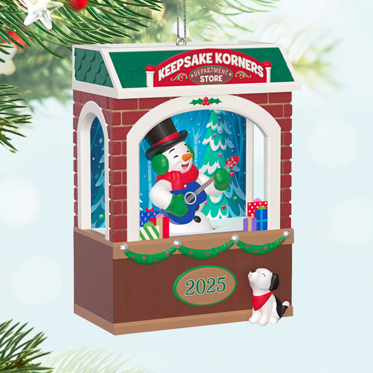 Snowman playing guitar with barking puppy in store window, Hallmark Rockin&