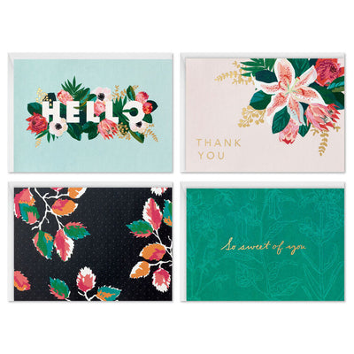 Boxed floral note card set featuring four unique designs with gold foil accents, includes 40 cards and envelopes.
