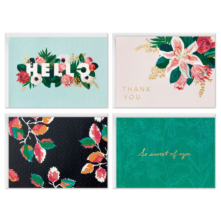 Boxed floral note card set featuring four unique designs with gold foil accents, includes 40 cards and envelopes.
