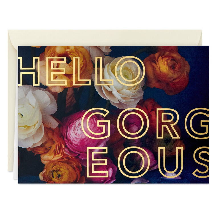 Blank note cards with vivid floral background and “HELLO GORGEOUS” gold foil lettering, boxed with envelopes.
