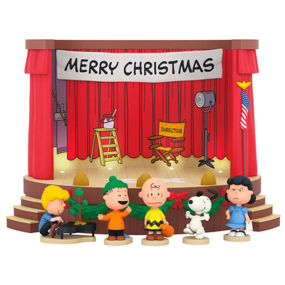 Peanuts tabletop Christmas decoration featuring Charlie Brown and friends on stage with lights and sound effects from A Charlie
