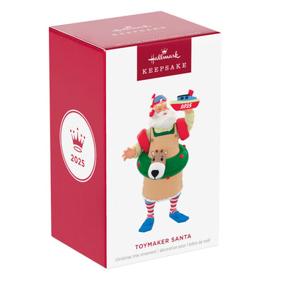 Santa in snorkel mask, arm floaties, and striped socks, with reindeer swim tube and toy boat marked 2025, Hallmark Keepsake ornament
