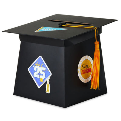 Mortarboard-shaped graduation card holder box with a gold tassel and 2025 stickers for personalizing, perfect for collecting cards and well wishes at a grad party.

