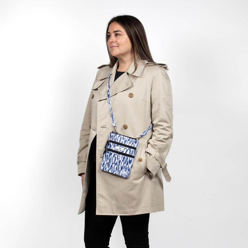 Summer Friyay print crossbody with 3 zip compartments, adjustable strap, and magnetic back pocket—compact and lightweight.