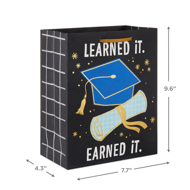 Medium black graduation gift bag with "Learned It. Earned It." and blue mortarboard and diploma, Hallmark, gold foil accents, 9.6 inch size
