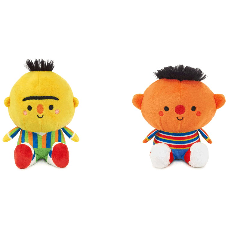 Plush Bert and Ernie toys with magnetic connectors, colorful outfits, and embroidered Sesame Street features.
