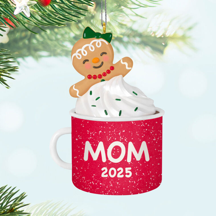 2025 Christmas ornament of gingerbread mom cookie in red mug with whipped cream, festive holiday design

