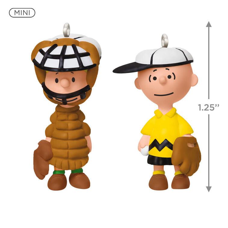 Set of two mini ornaments: Charlie Brown in baseball hat and glove, Schroeder in catcher’s gear, Hallmark Peanuts Christmas collectibles
