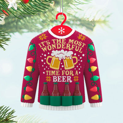 Red Christmas sweater ornament with beer mugs, bottles, and string lights design.

